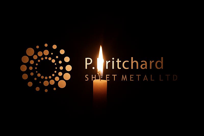 A lit candle in front of the P. Pritchard Sheet Metal logo on a dark background
